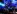 John Fogerty, motor pokojnega kultnega benda Creedence Clearwater Revival,  na osrednjem tržaškem trgu, s prstom, usmerjenim v bližajoče se neurje, ki je pretrgalo zabavo  Foto: Andraž Gombač