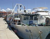 Težave nekaterih ribičev, ki imajo po obnovi ribiškega pristanišča v Kopru otežen vstop in izstop s plovil, bodo na občini poskušali rešiti s pontoni ali plavajočim pomolom Foto: Petra Vidrih