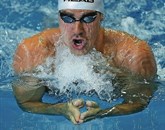 Slovenski plavalec Damir Dugonjić je na evropskem prvenstvu v plavanju v 25-metrskih bazenih v Herningu osvojil prvo mesto na 50 metrov prsno. S časom 26,21 je dosegel tudi nov državni rekord. Foto: STA