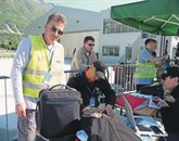 Predsednik Aerokluba Bovec Dejan Kavčič   s kolegi že mnogo let zagnano in povsem prostovoljno skrbi za letališče Foto: Neva Blazetič