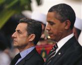 Neformalen pogovor med Sarkozyjem in Obamo je ujelo več novinarjev Foto: Reuters