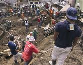  Reševalci in prebivalci Manizalesa iščejo preživele Foto: Reuters