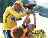 Lance Armstrong s svojimi otroki Foto: Stefano Rellandini