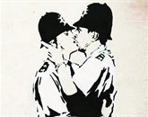 Grafit Poljubljajoča policista britanskega uličnega umetnika Banksyja so na dražbi v Miamiju prodali za 575.000 dolarjev 