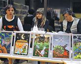 Krakajoče papagaje so v Mestni knjižnice  predstavile prevajalka Špela Pahor, ilustratorka Laura Ličer in prevajalka spremne besede Tea Štoka 