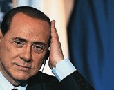 Nekdanji italijanski premier Silvio Berlusconi je danes dejal, da ni njegova krivda, če želijo vlado zapustiti ministri iz njegove stranke Ljudstvo svobode (PDL), ker je bil obsojen zaradi davčne prevare Foto: Nn