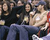 Ameriška hollywoodska zvezdnica Demi Moore je potegnila črto pod svoj tretji zakon, v katerem je šest let preživela z igralskim kolegom Ashtonom Kutcherjem Foto: Danny Moloshok