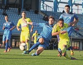 Mariborčan Marcos Tavares  (desno v rumenem dresu) je proti Novogoričanom dosegel zadetek na obeh medsebojnih obračunih v letošnji sezoni   Foto: Boĺˇtjan Bensa