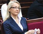 Direktorica občinske uprave Sabina Mozetič je včeraj na sodišču povedala, da krivde za očitano kaznivo dejanje ne priznava, izjav za medije pa ni dajala Foto: Fpa
