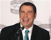 Ameriški igralec John Travolta se je znašel sredi spolnega škandala, saj ga tožita maserja, ki naj bi ju igralec med masažo spolno nadlegoval Foto: Brendan Mcdermid