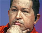 Nacionalni volilni svet Venezuele je sporočil, da je po 90 odstotkih preštetih glasov dosedanji predsednik Venezuele Hugo Chavez na nedeljskih volitvah osvojil 54 odstotkov glasov Foto: Reuters